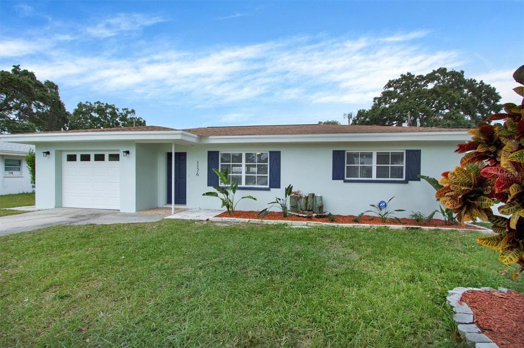 1176 FRIAR TUCK LANE DUNEDIN, FL 34698