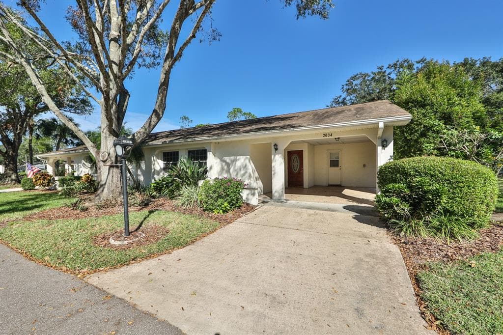 2004 HULLHOUSE DRIVE SUN CITY CENTER, FL 33573