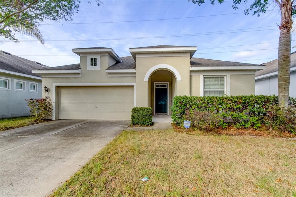 7932 CAMDEN WOODS DRIVE TAMPA, FL 33619