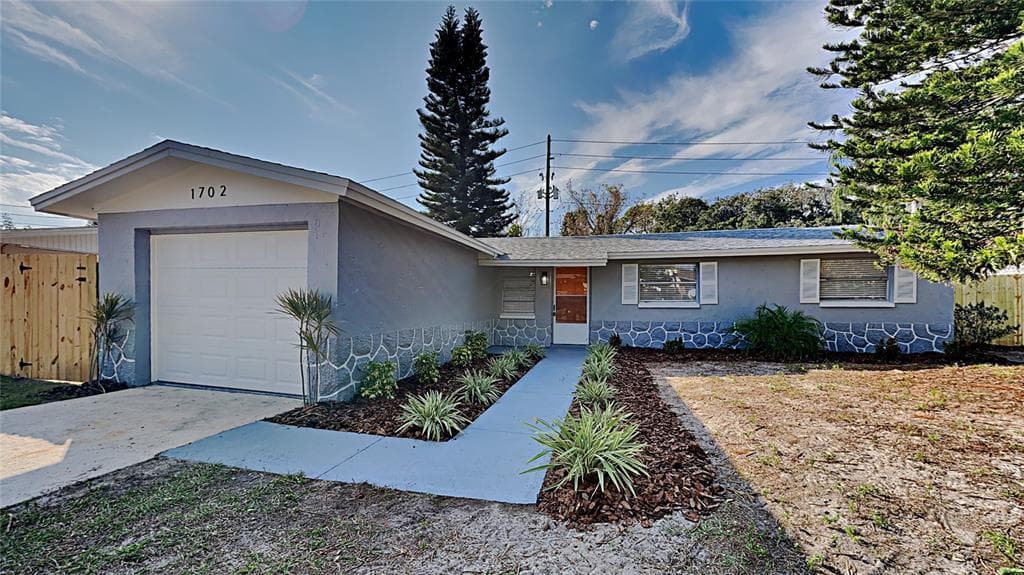 1702 COPPERTREE DRIVE TARPON SPRINGS, FL 34689