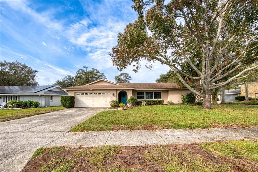 933 WINDING OAKS DRIVE PALM HARBOR, FL 34683