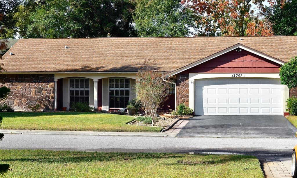 12301 QUAIL RUN ROW HUDSON, FL 34667