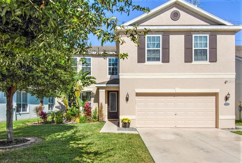 7936 CAMDEN WOODS DRIVE TAMPA, FL 33619