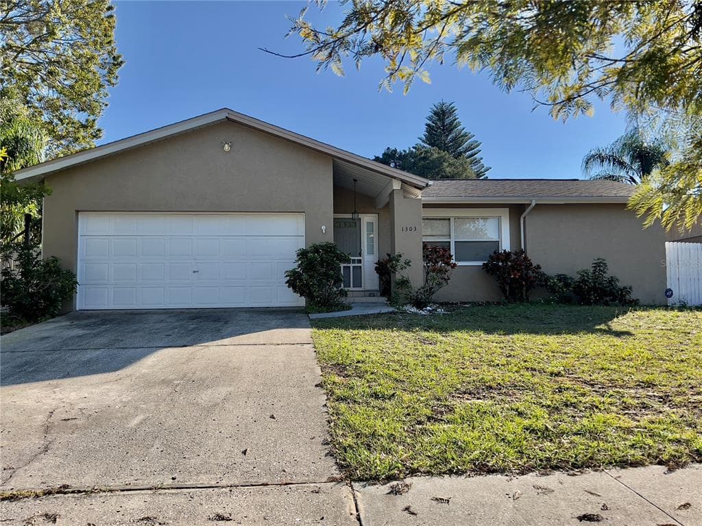 1303 CROSSBOW LANE TARPON SPRINGS, FL 34689