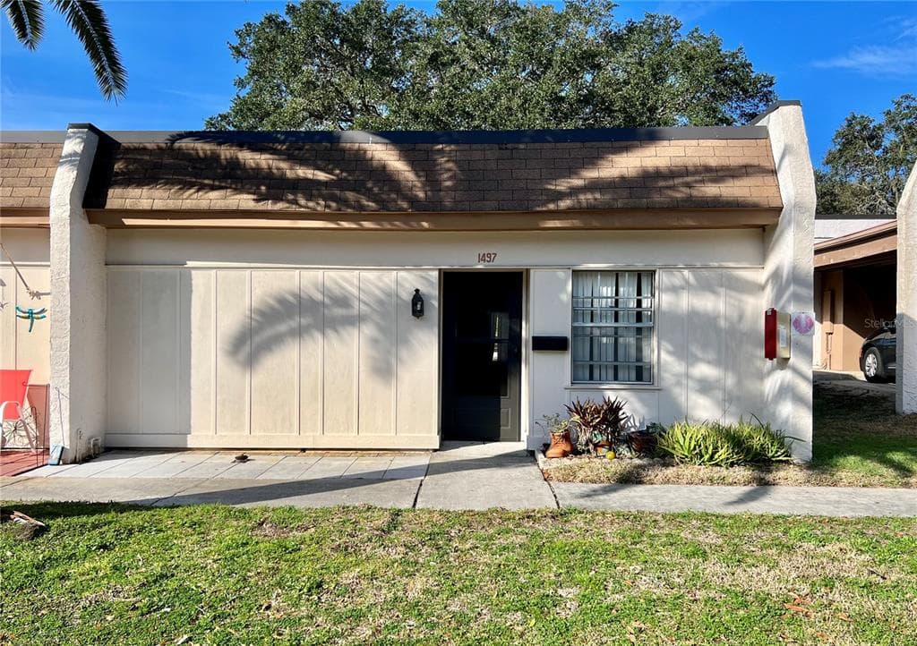 1497 FEATHER DRIVE UNIT 64-C CLEARWATER, FL 33759
