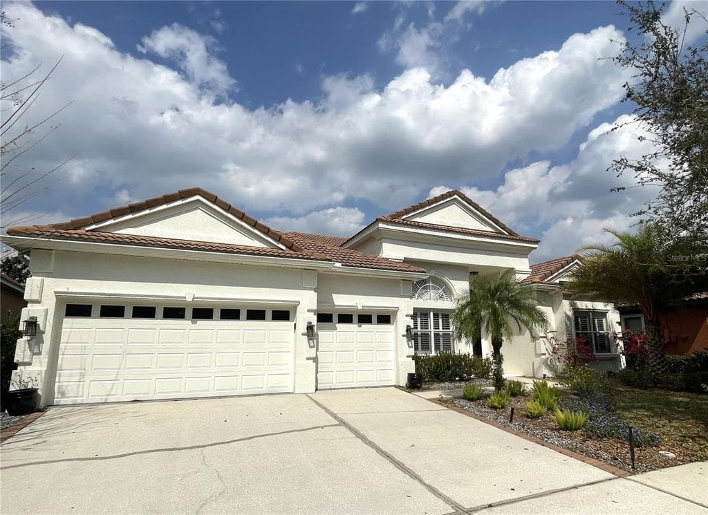 8310 WINDSOR BLUFF DRIVE TAMPA, FL 33647