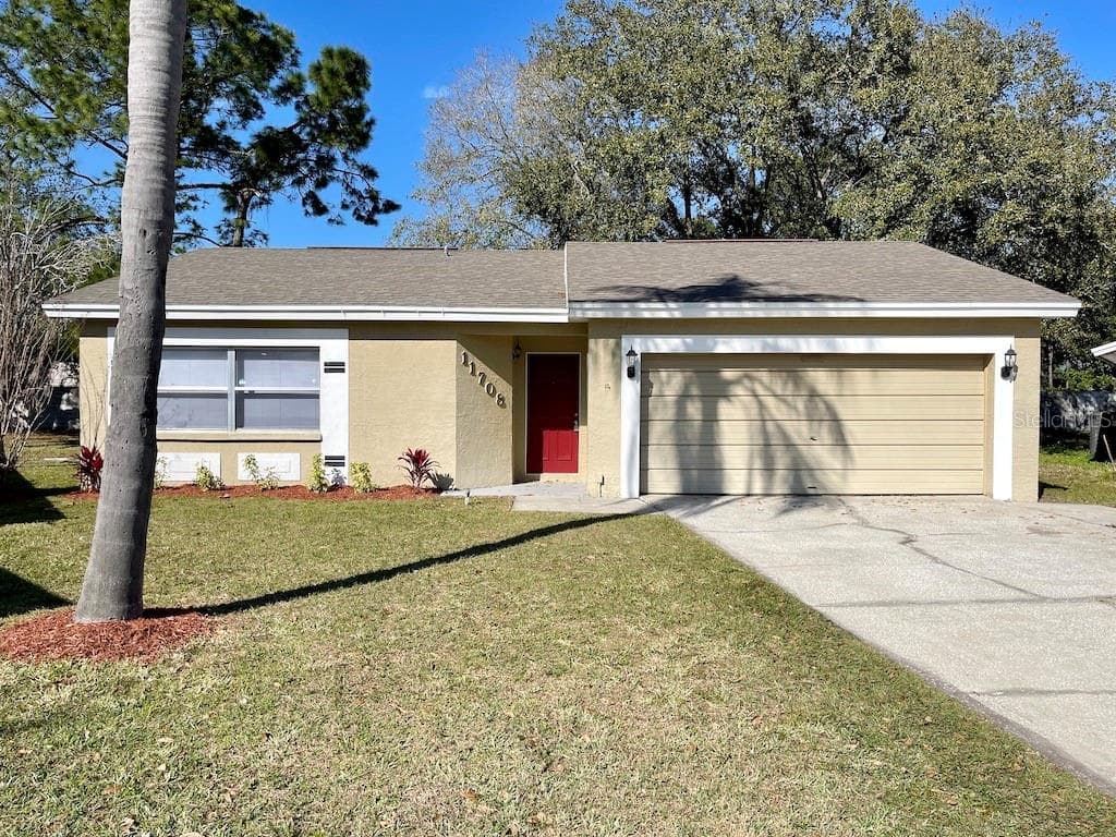 11708 PAINTED HILLS LANE TAMPA, FL 33624