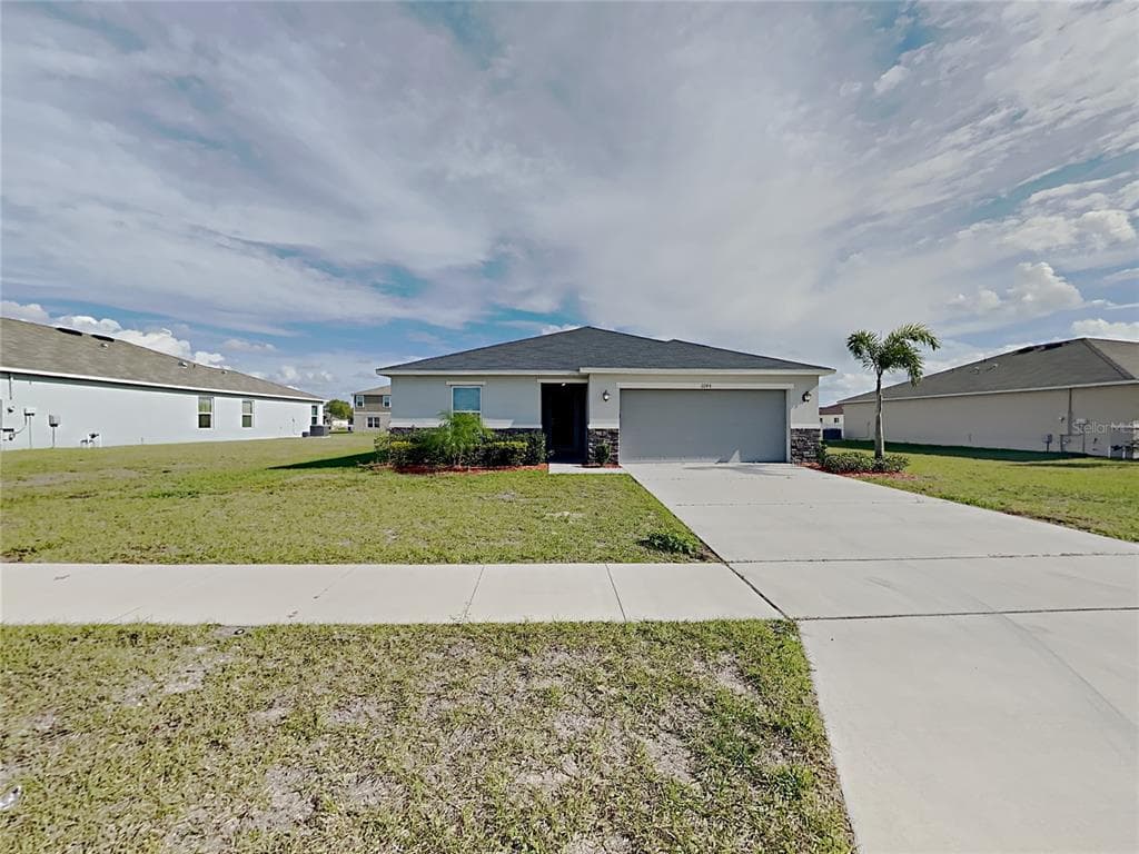 2244 GLADIOLUS LANE MASCOTTE, FL 34753
