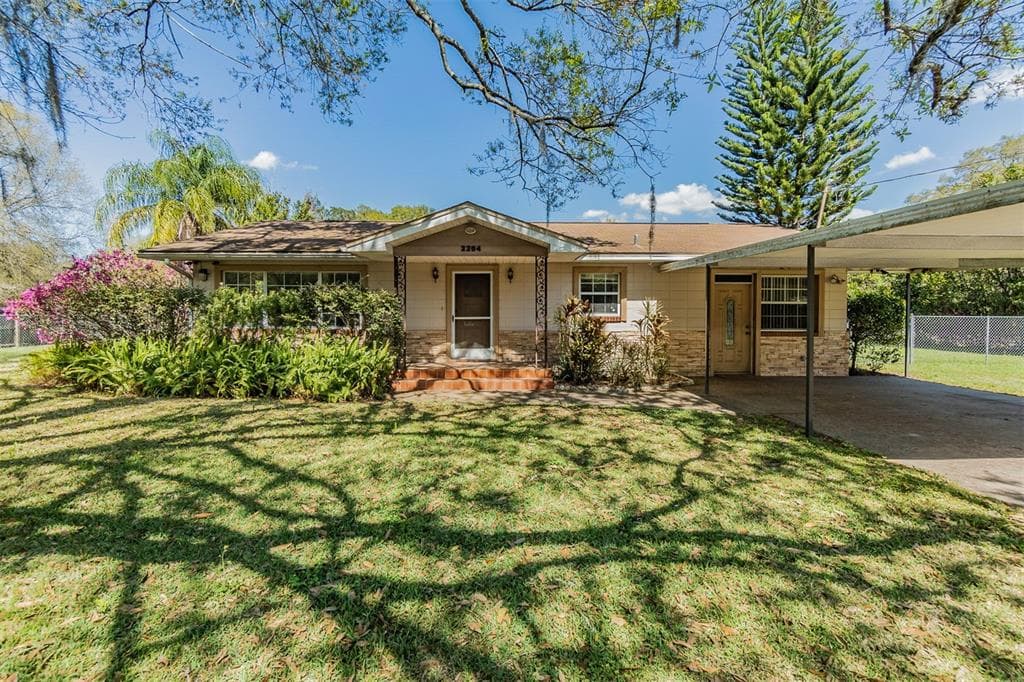 2204 E 148TH AVENUE LUTZ, FL 33549