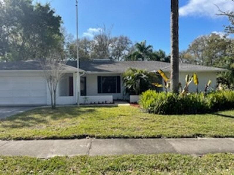 180 WOODCUTTER LANE PALM HARBOR, FL 34683
