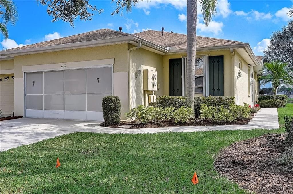 1210 HUNTINGTON GREENS DRIVE UNIT 1210 SUN CITY CENTER, FL 33573