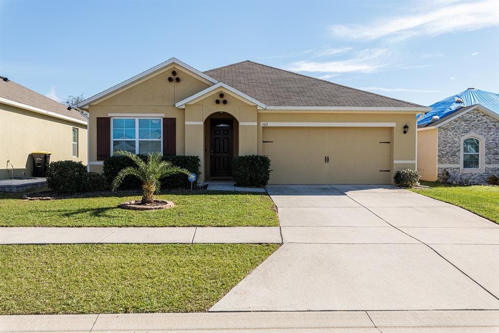 122 LAZY WILLOW DRIVE DAVENPORT, FL 33897