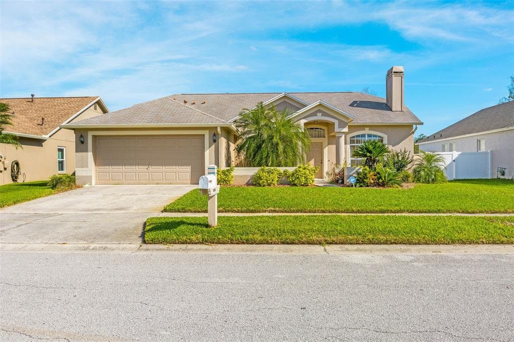 1128 BIG SKY DRIVE WESLEY CHAPEL, FL 33543