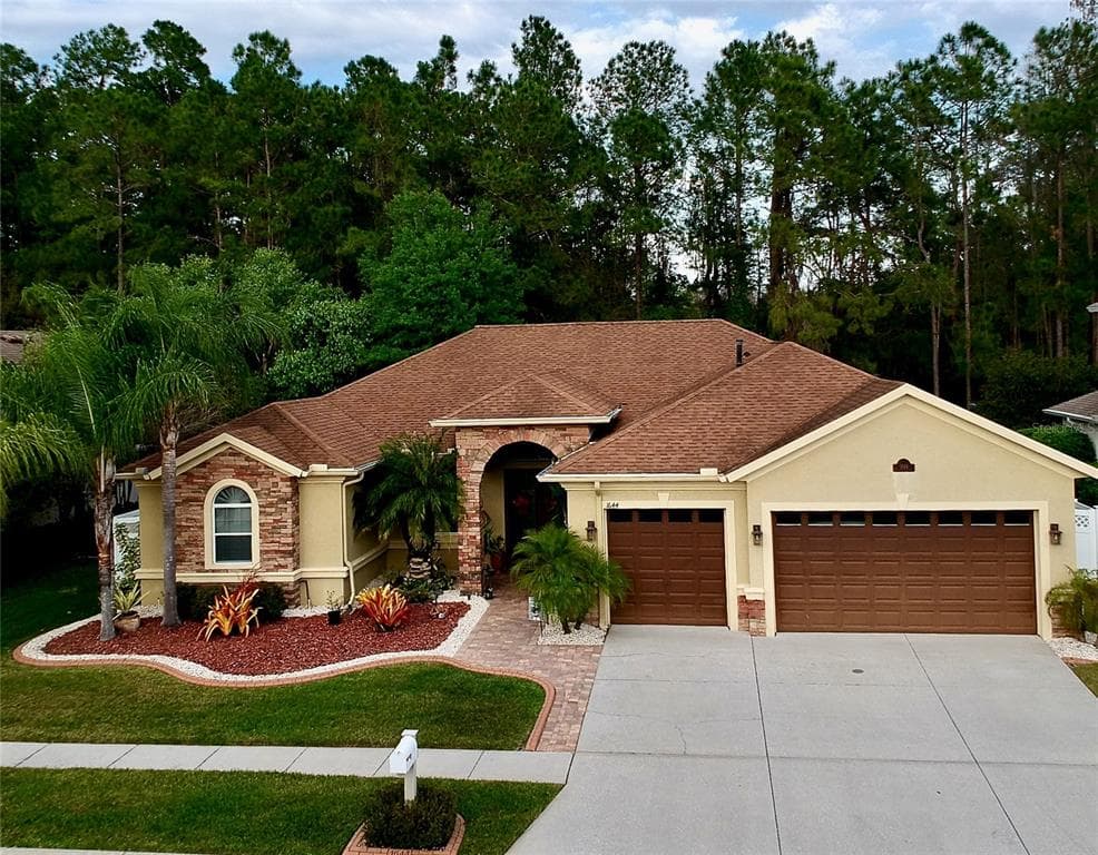 1644 BEACONSFIELD DRIVE WESLEY CHAPEL, FL 33543
