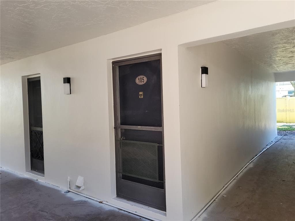 1146 KING ARTHUR COURT UNIT 105 DUNEDIN, FL 34698