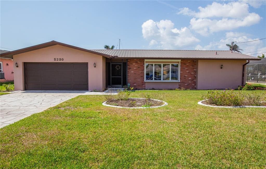 5230 SARASOTA COURT CAPE CORAL, FL 33904