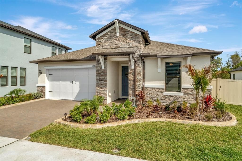 9890 WILD BEGONIA LOOP LAND O LAKES, FL 34637