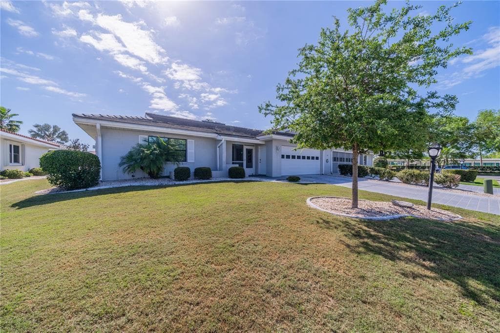 1603 WOODMAR DRIVE SUN CITY CENTER, FL 33573
