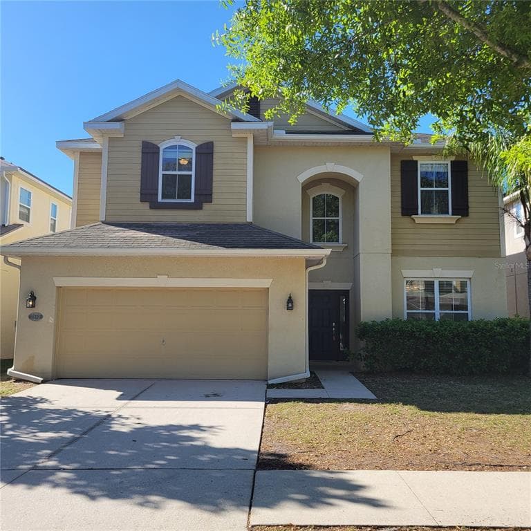 7982 CAMDEN WOODS DRIVE TAMPA, FL 33619