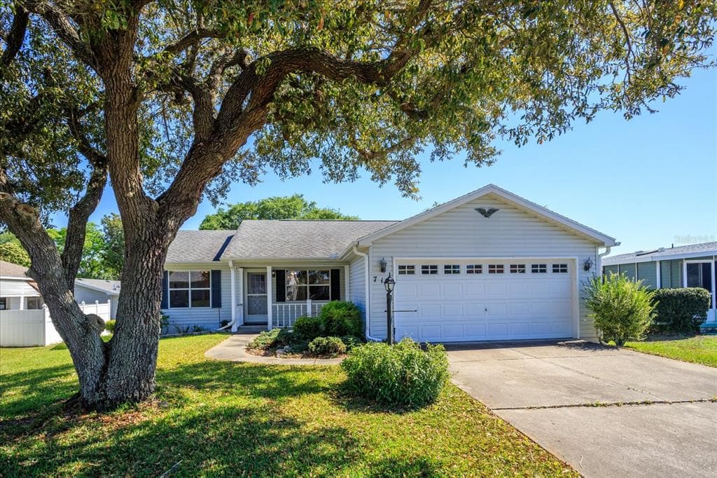 719 PRADO DRIVE LADY LAKE, FL 32159