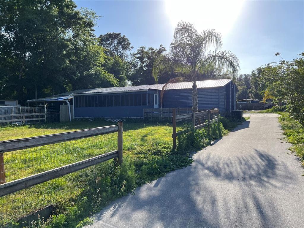 6409 WOODSMAN DRIVE WESLEY CHAPEL, FL 33544