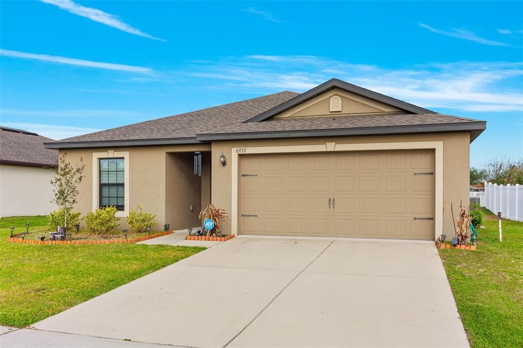 6937 CRESTED ORCHID DRIVE