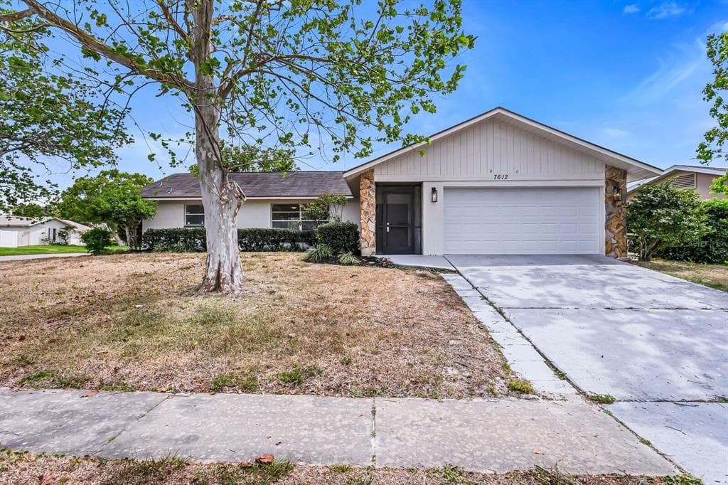 7612 LAKESIDE WOODLANDS DRIVE HUDSON, FL 34667