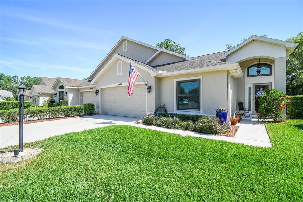 9338 WHISPERING MEADOW COURT