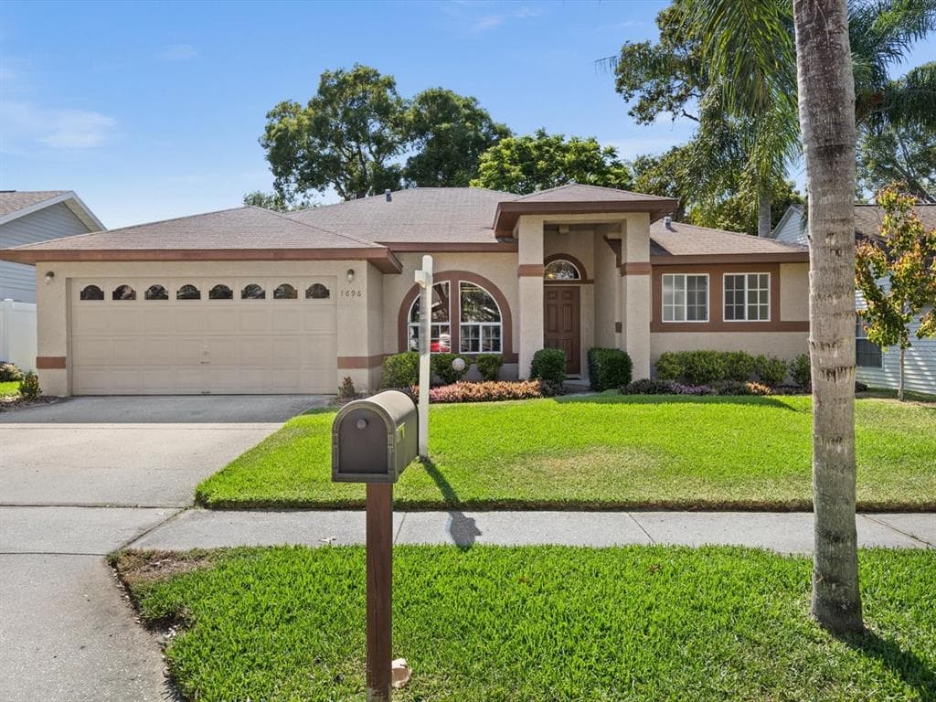 1696 SILVERWOOD STREET TARPON SPRINGS, FL 34689