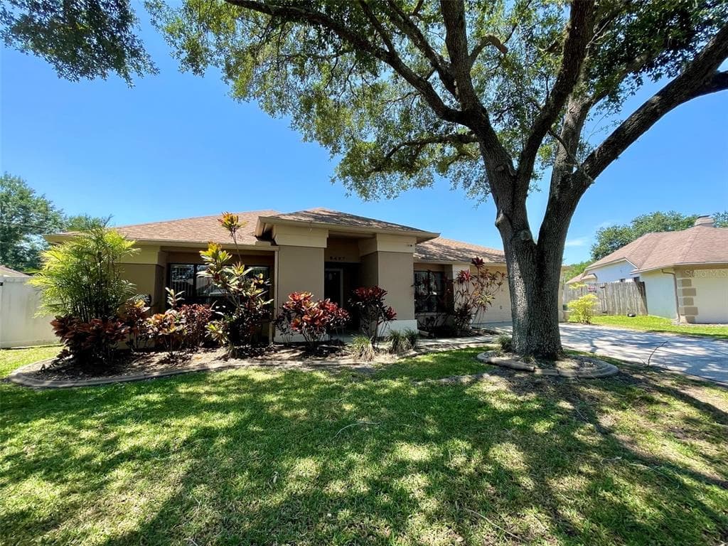 9407 PEBBLE GLEN AVENUE TAMPA, FL 33647