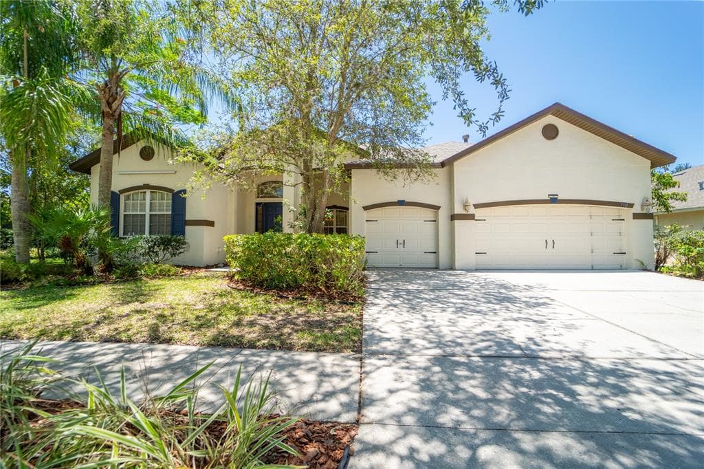 7313 CARRINGTON OAKS LANE