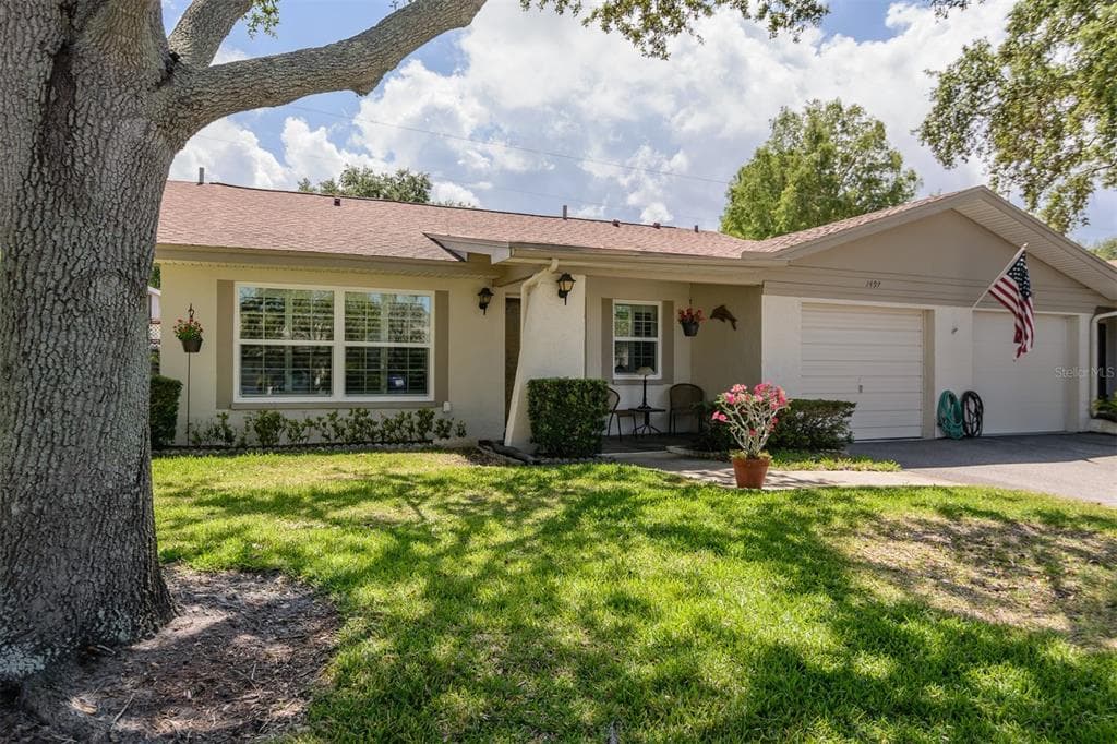 1497 HEATHER RIDGE BOULEVARD DUNEDIN, FL 34698