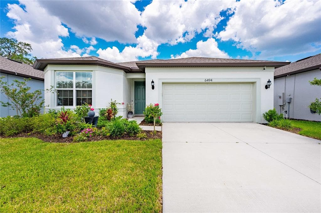 6494 BRADFORD WOODS DRIVE ZEPHYRHILLS, FL 33542