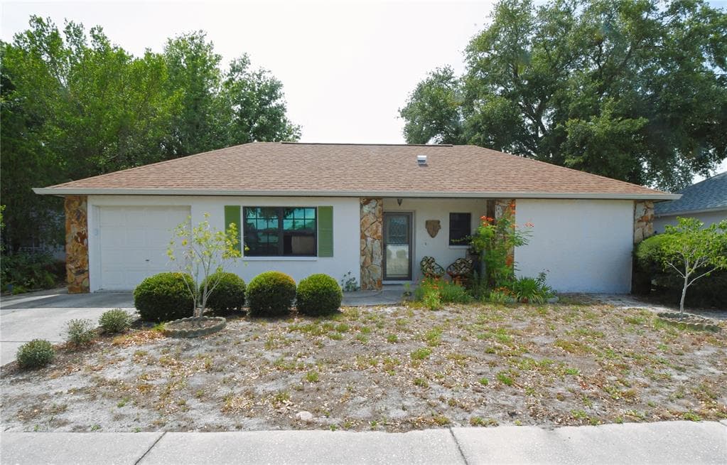 1323 CALAMONDIN DRIVE HOLIDAY, FL 34691