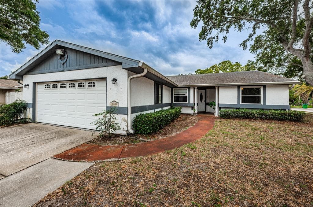 1031 PERSIMMON DRIVE PALM HARBOR, FL 34683