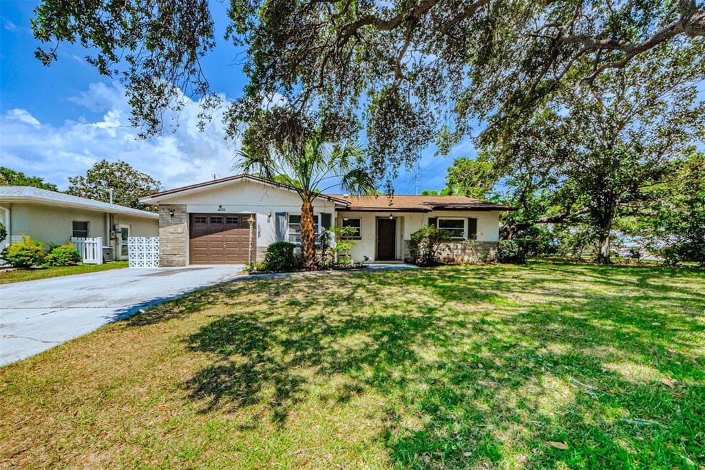 1409 GLADYS CIRCLE DUNEDIN, FL 34698