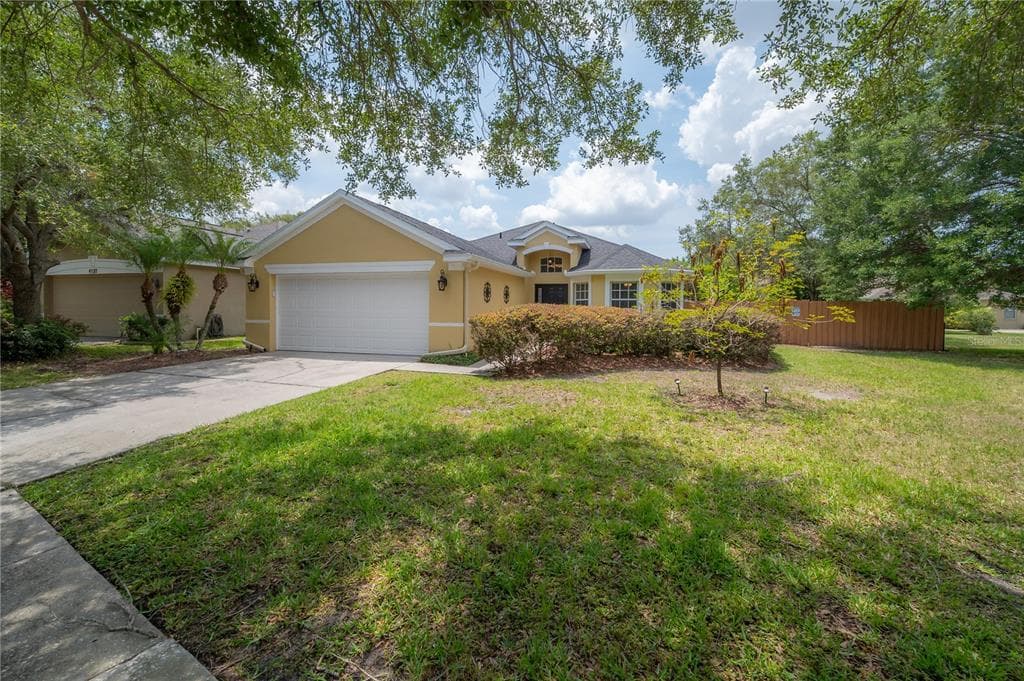4734 WHISPERING WIND AVENUE TAMPA, FL 33614