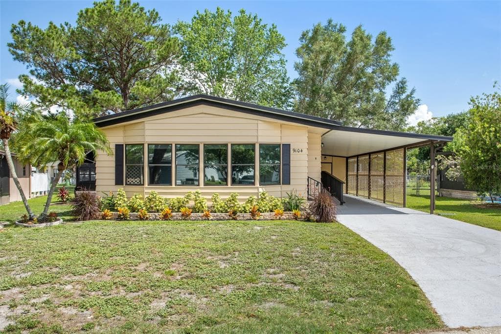 9104 SHELDON WEST DRIVE TAMPA, FL 33626