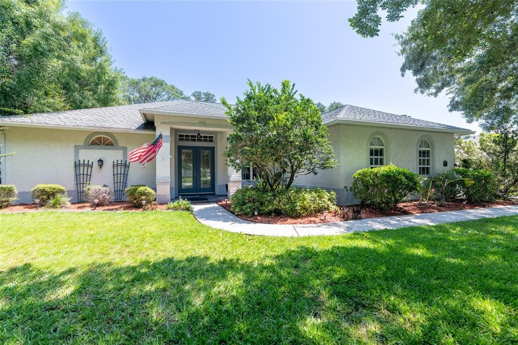 1532 CAMPHOR COVE DRIVE LUTZ, FL 33549