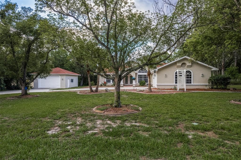 10314 WOODLAND WATERS BOULEVARD WEEKI WACHEE, FL 34613