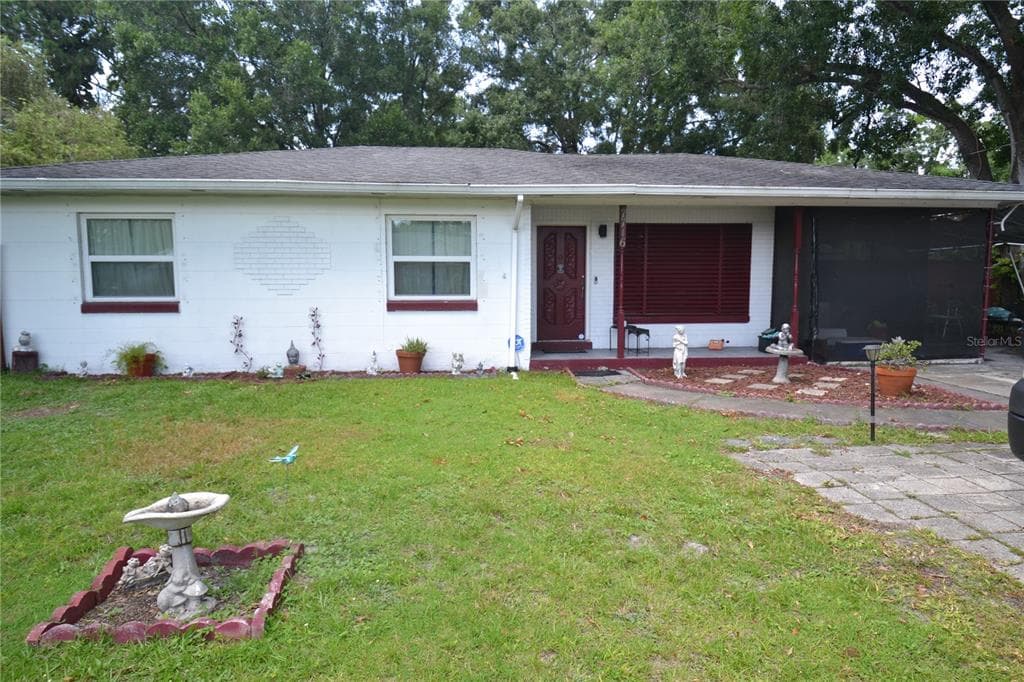 7716 E COMANCHE AVENUE TAMPA, FL 33610