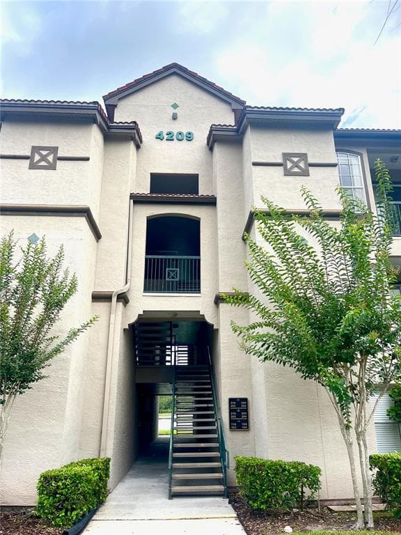 4209 WOODSTORKS WALK WAY UNIT 1209 LUTZ, FL 33558