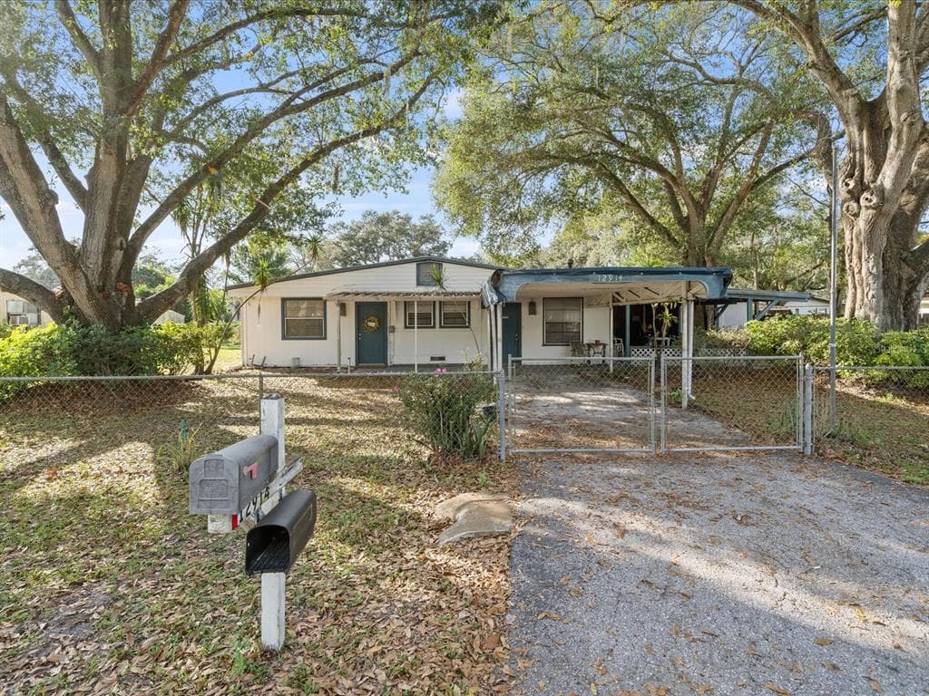 12914 CAMBRIDGE AVENUE TAMPA, FL 33624