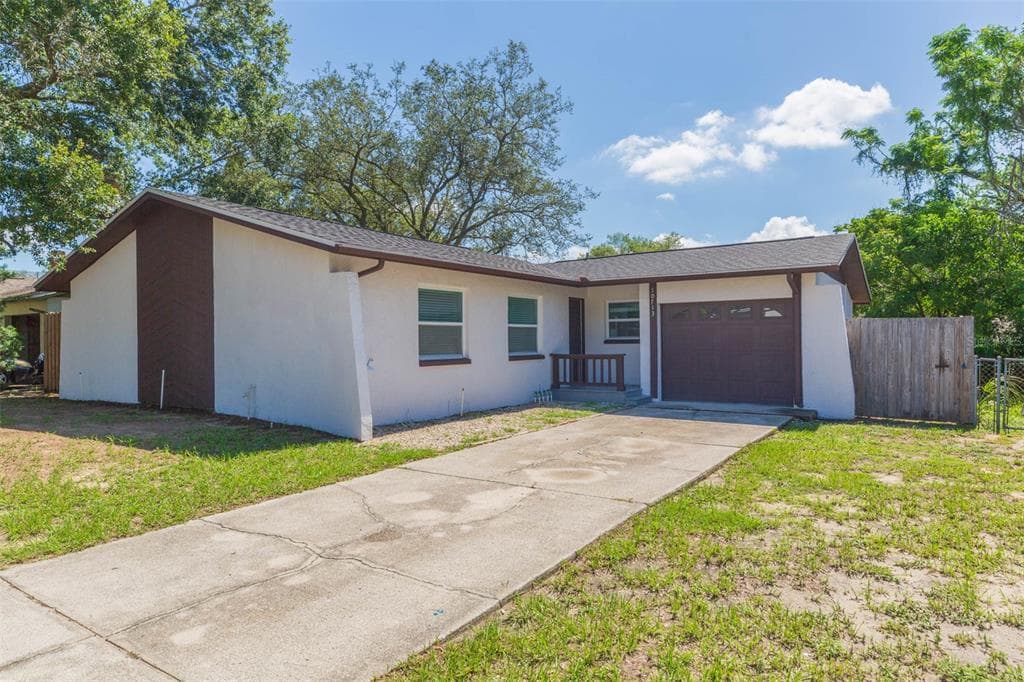 10713 N OJUS DRIVE TAMPA, FL 33617
