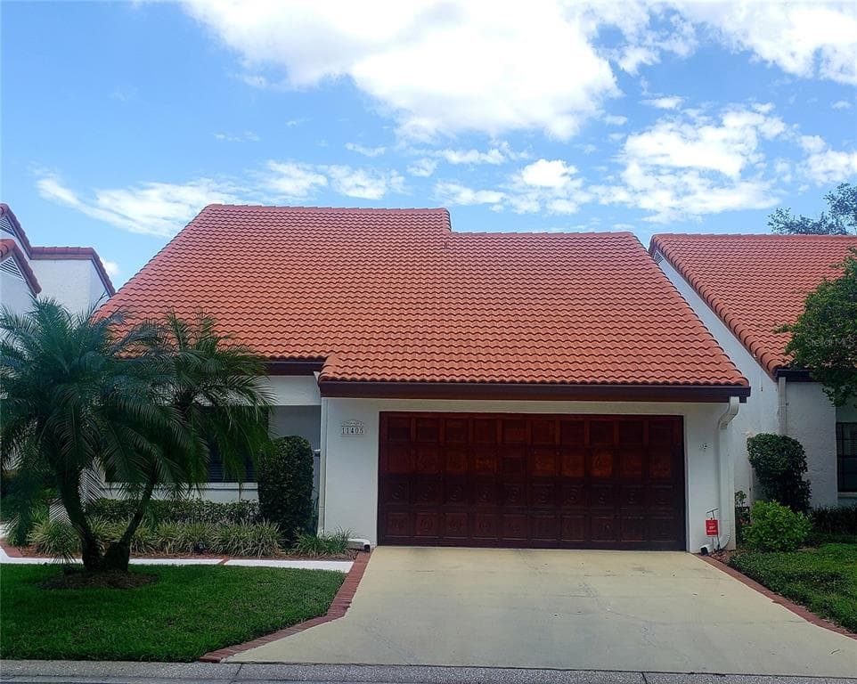 11405 CERCA DEL RIO PLACE