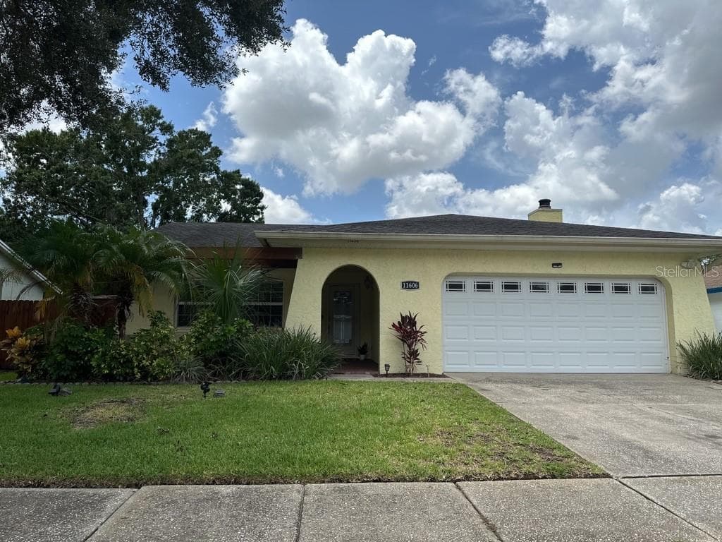 11606 PAINTED HILLS LANE TAMPA, FL 33624