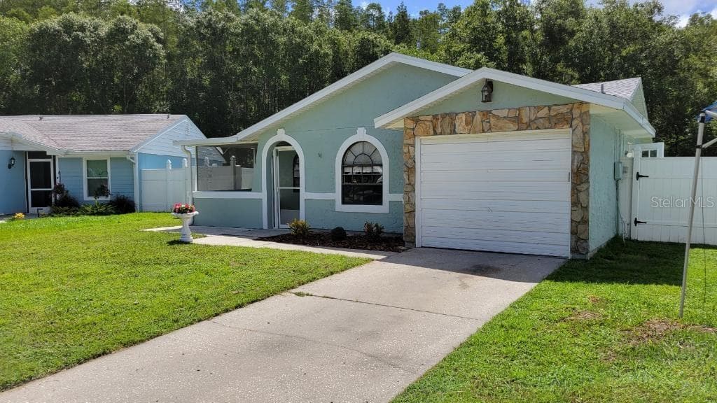 12229 HIDDEN BROOK DRIVE TAMPA, FL 33624