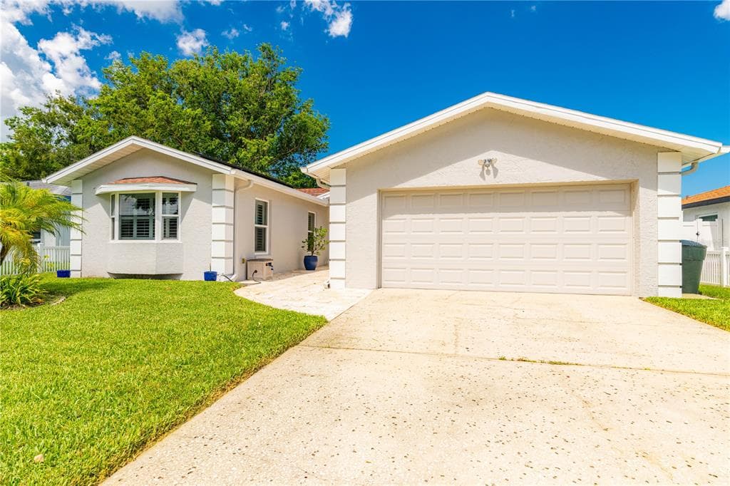 1426 WINDMOOR DRIVE DUNEDIN, FL 34698