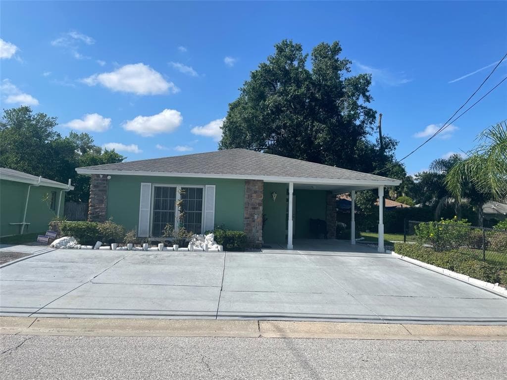 4211 E OSBORNE AVENUE TAMPA, FL 33610