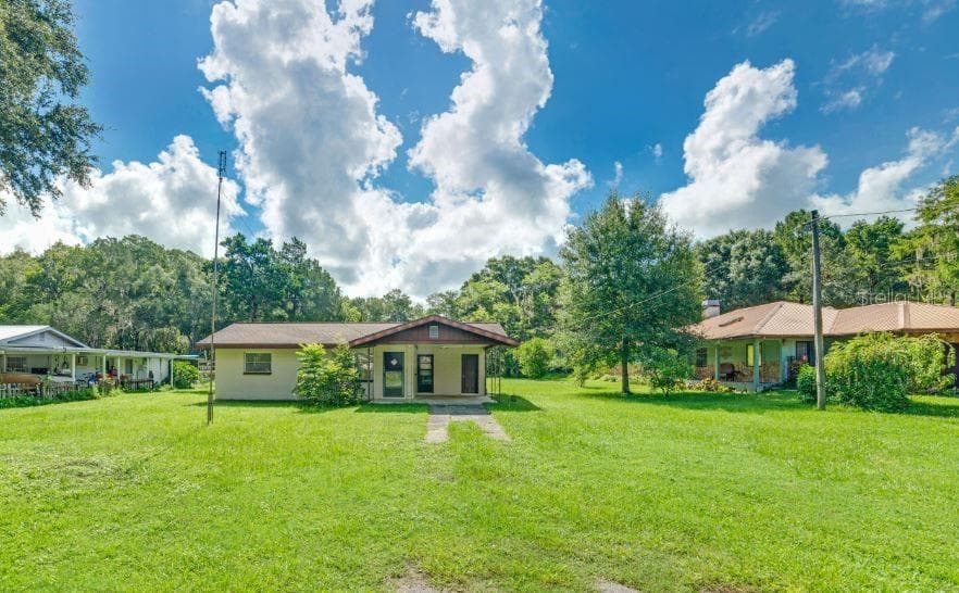 9404 E TSALA APOPKA DRIVE FLORAL CITY, FL 34436